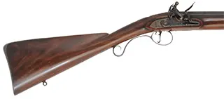 Fowler with Smooth and Rifled Barrels,
20 gauge, 35-1/2" octagon-to-round barrel,
.54 caliber, 33" octagon-to-round barrel,
L&R flint lock, walnut, iron trim, used